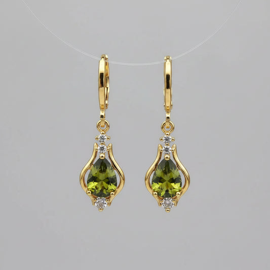 Gold earrings with green gemstones 