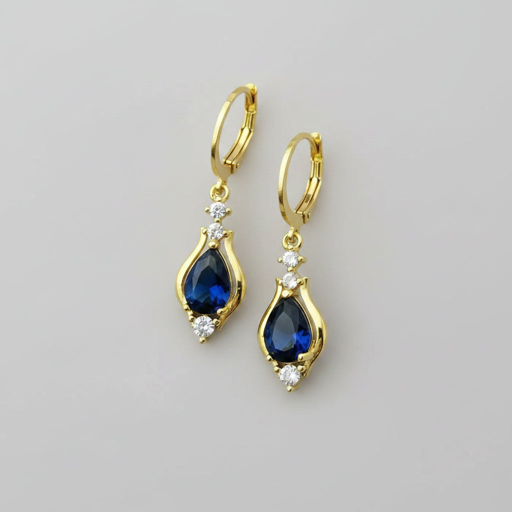 Gold earrings with blue stones