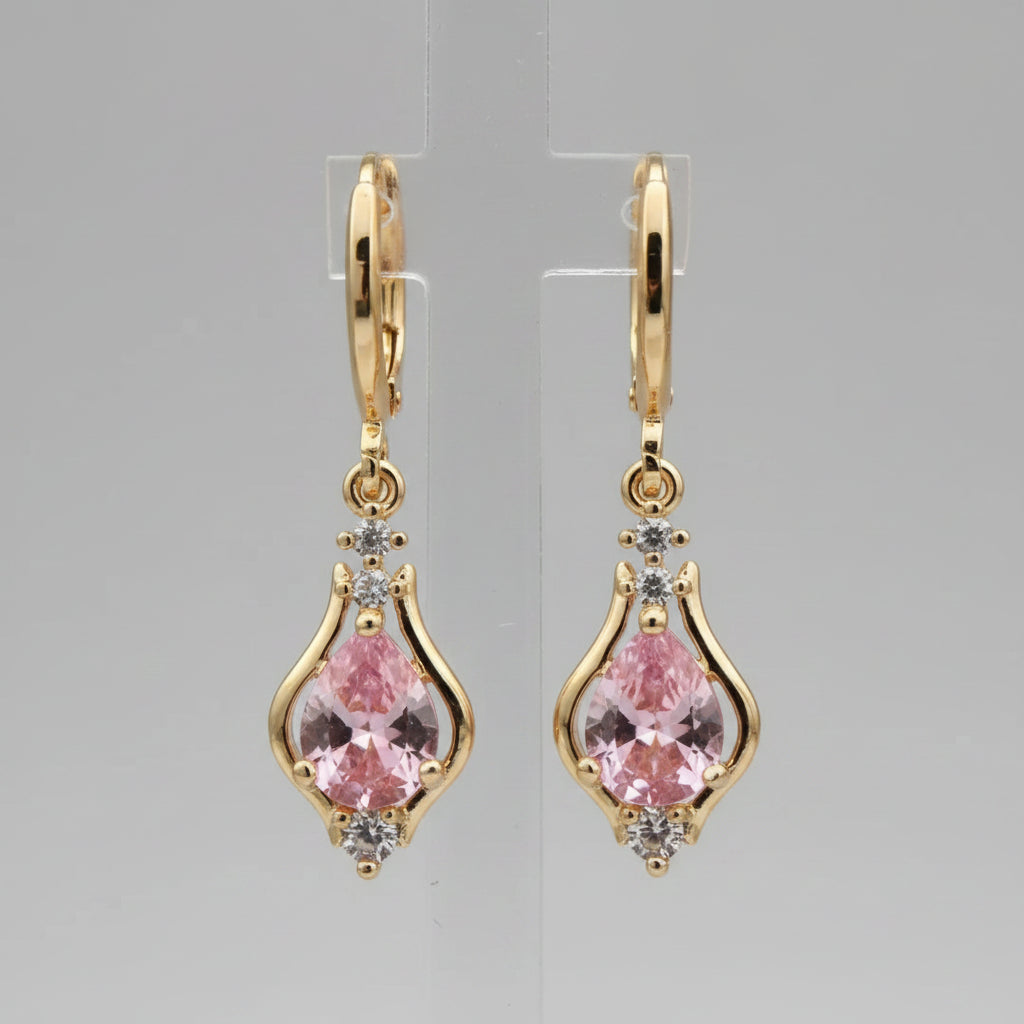 Gold earrings with pink stone