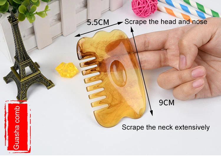 Hand holding a yellow Gua Sha tool with measurements and usage instructions, Eiffel Tower model in the background.
